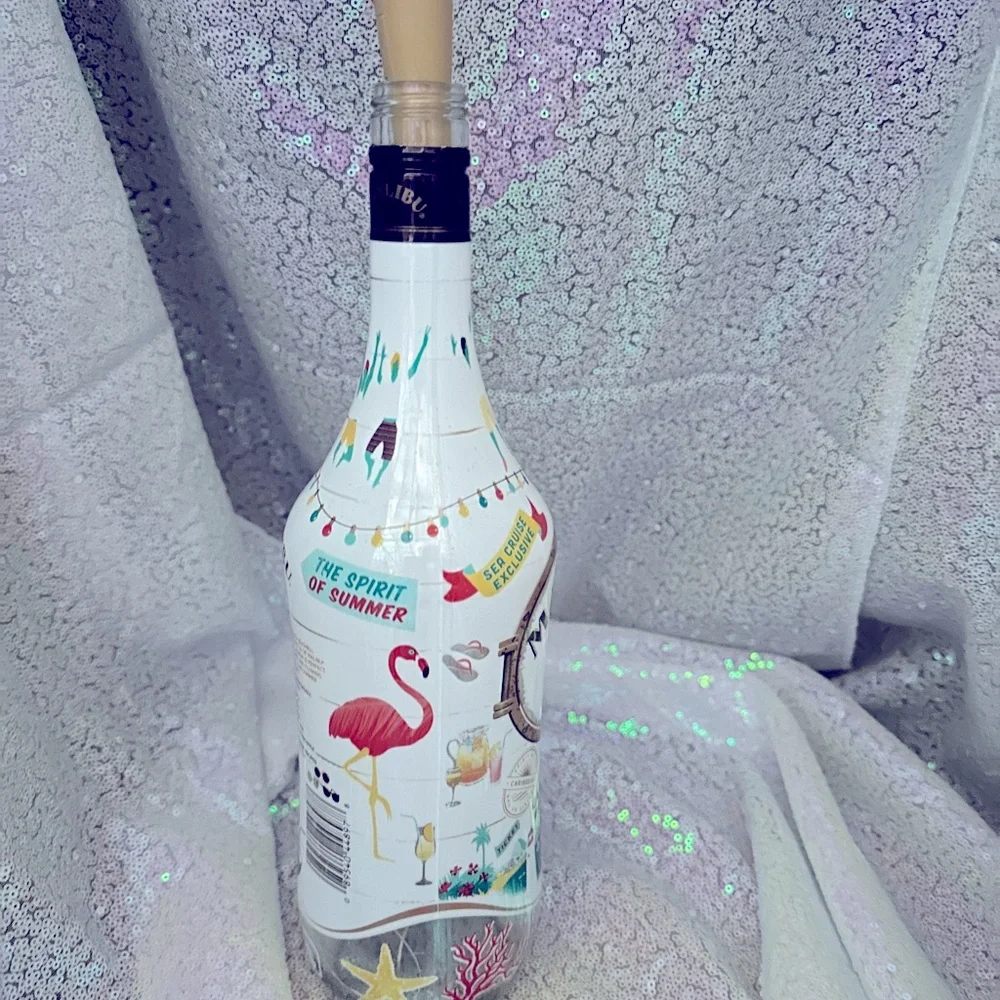 Bar back accent light, party accent or night light Malibu pink light bottle.